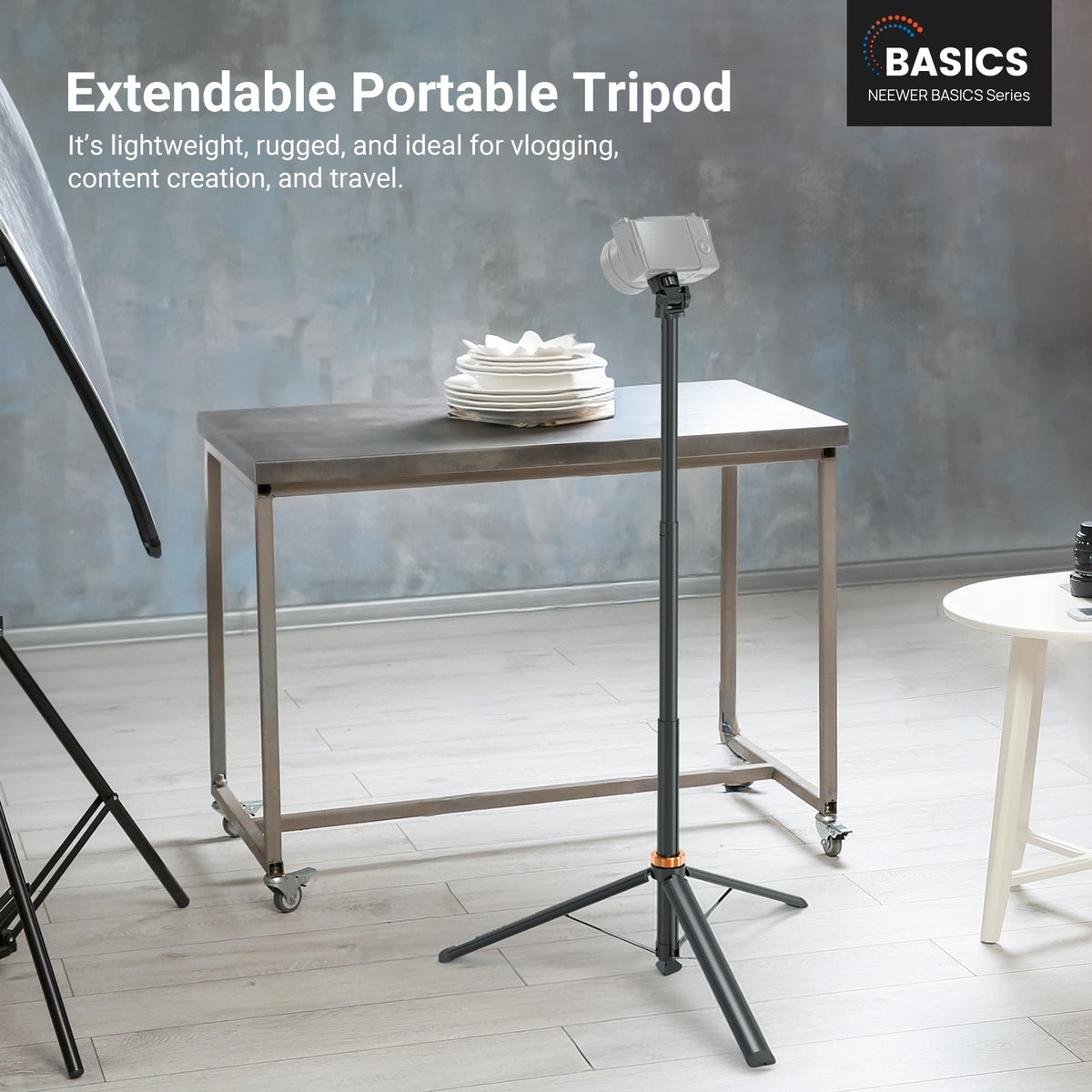 The NEEWER ST016 Light Stand is used to support a camera for photographing products on a table.